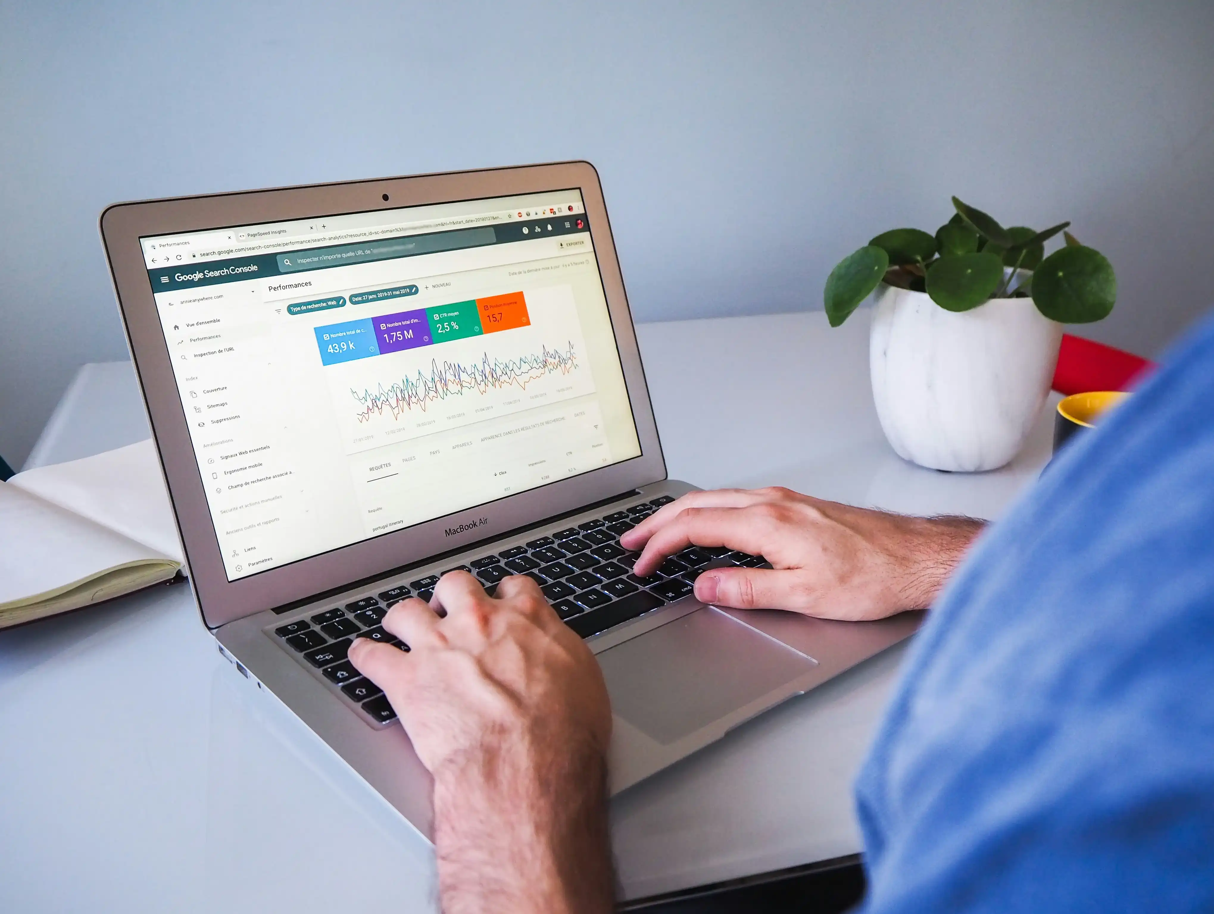 MacBook displaying SEO tools and search optimization workflow interface